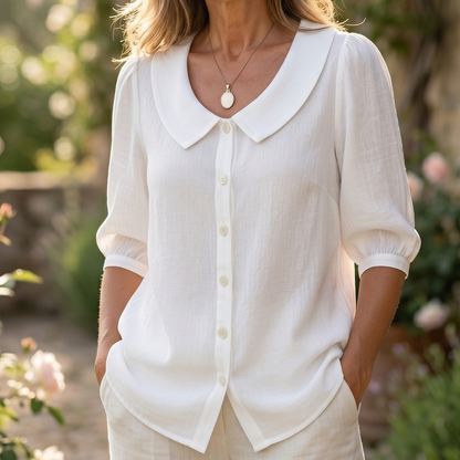 Blusa elegante de algodón ligero con cuello redondeado